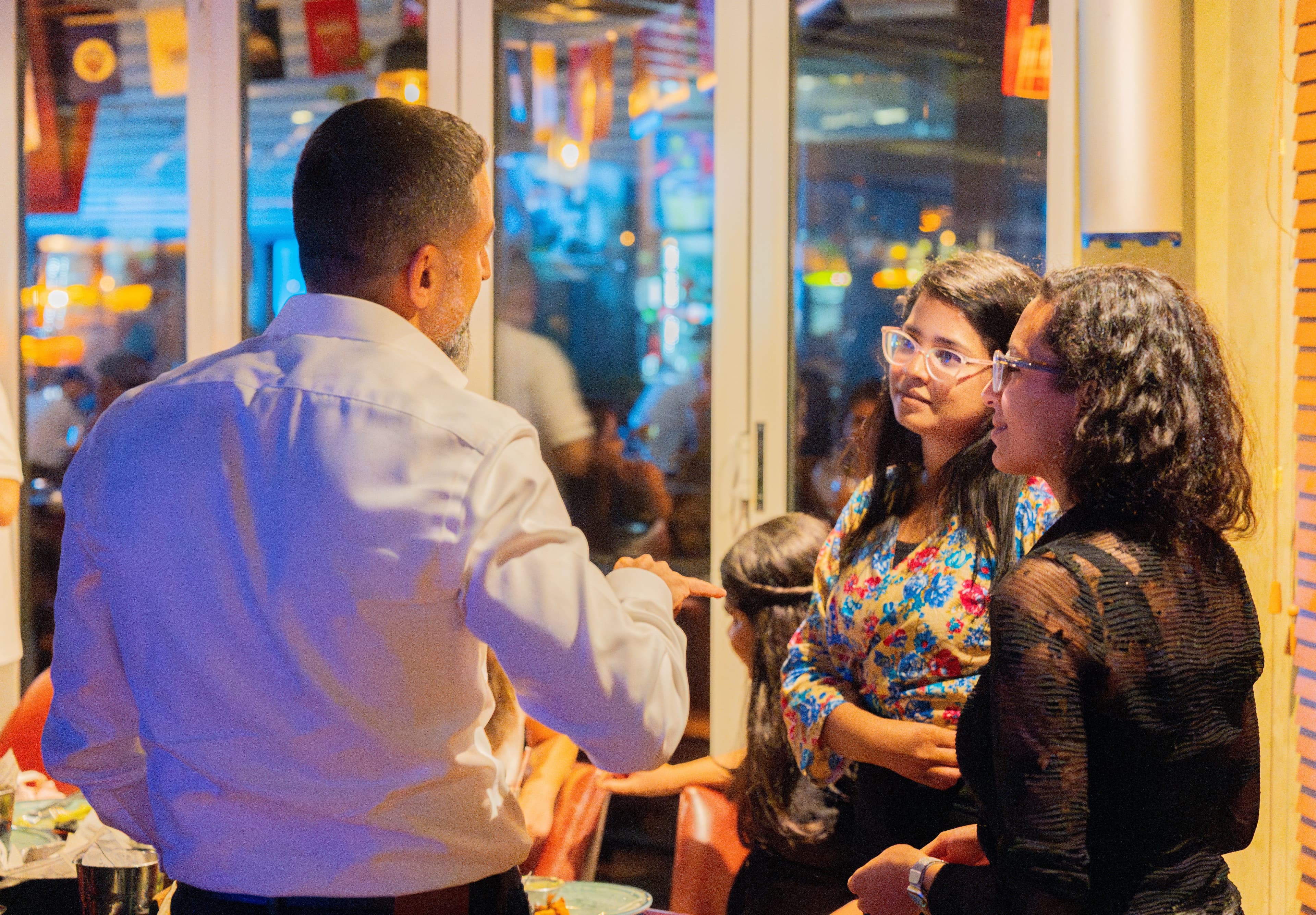 people at table with sticky notes